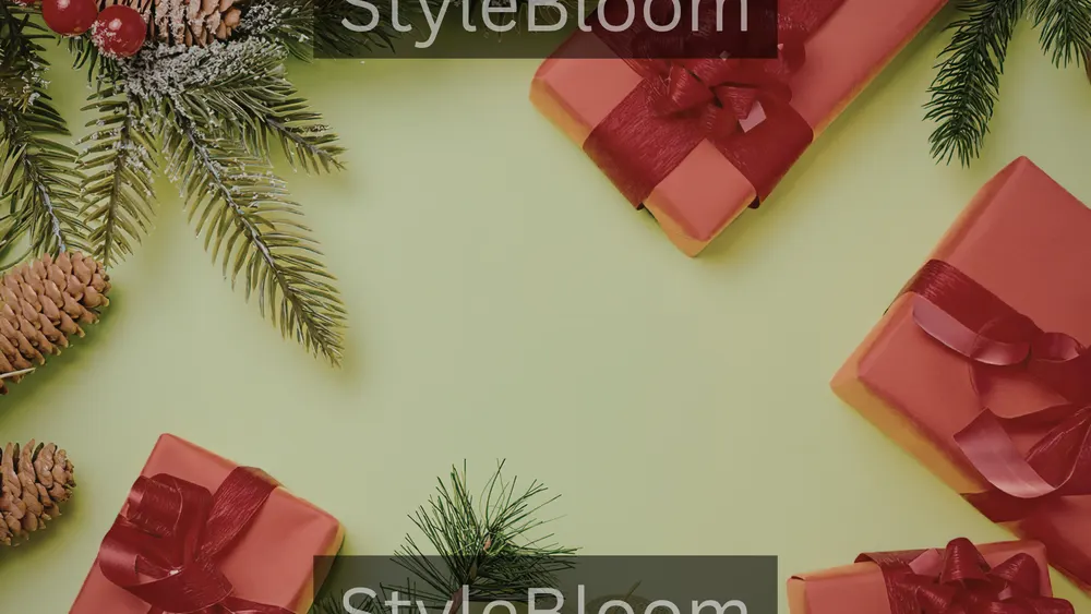 Red wrapped gifts with ribbons among frosted pine branches, pine cones and red berries on a pale green background.
