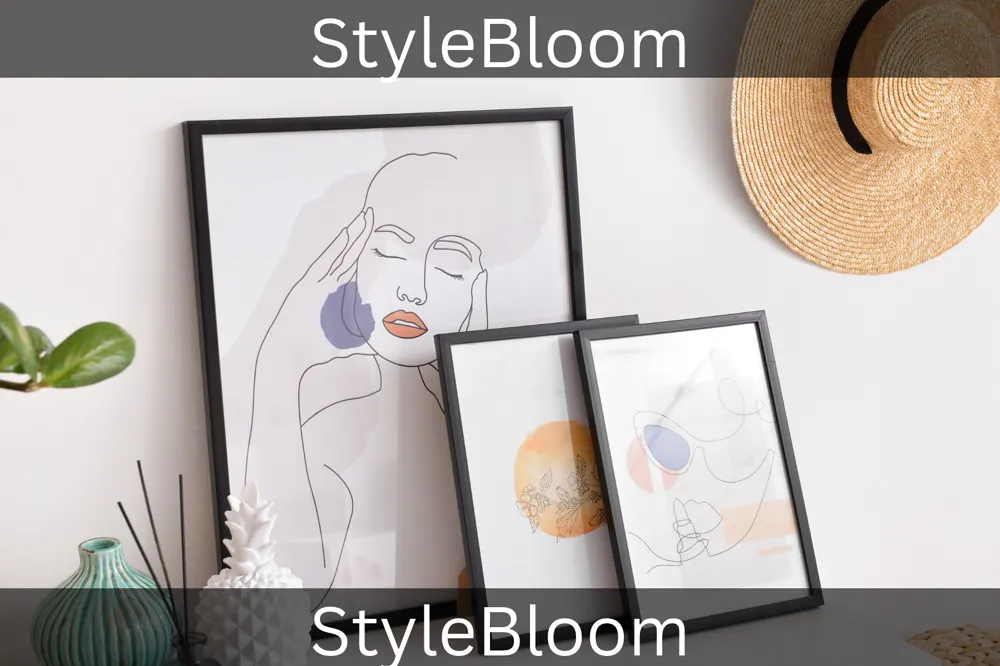 Three framed prints leaning against a living-room wall