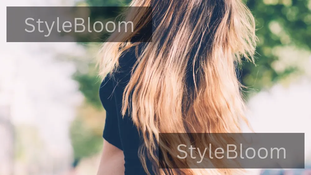 The finished look from behind — long, wavy blonde hair in daylight, with no visible clips or line.