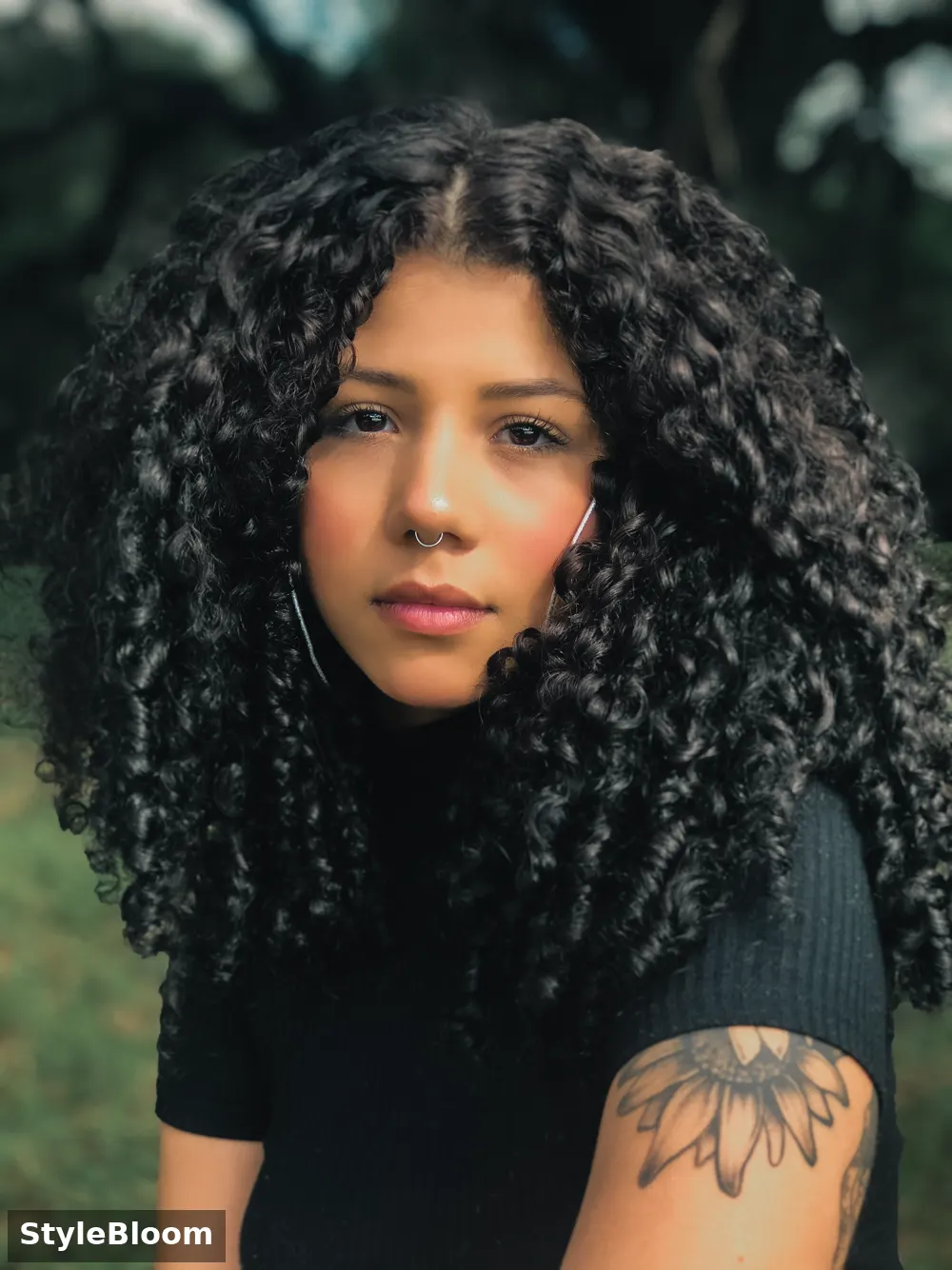 Curly hair with defined smooth texture after keratin care