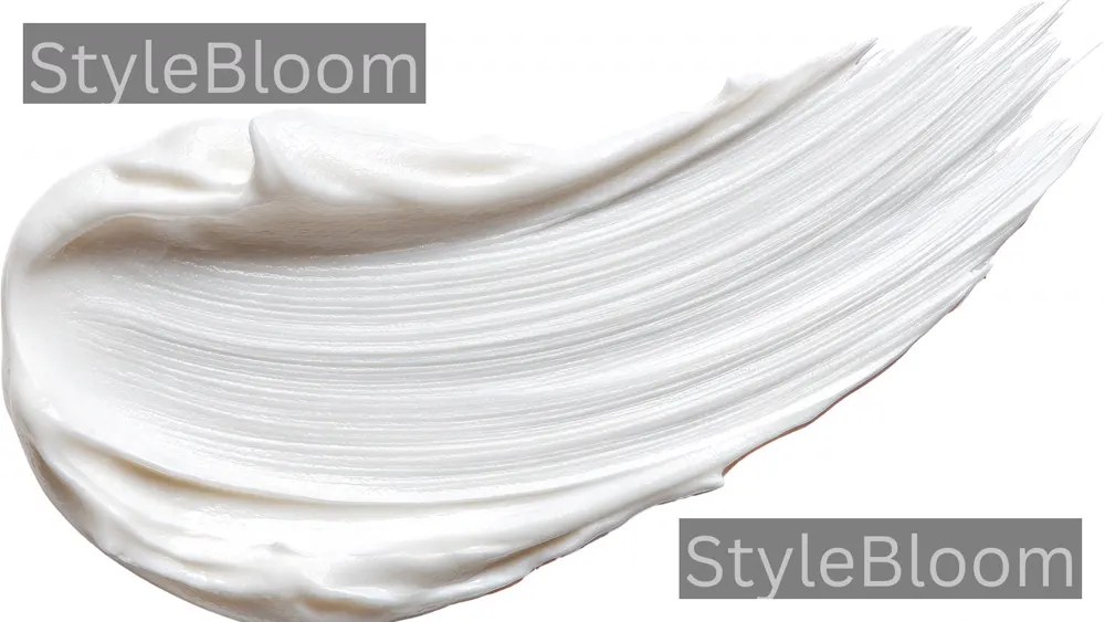 A thick cream swatch on a neutral background