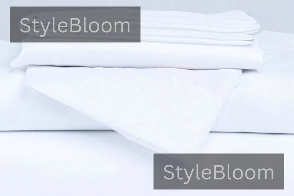 A stack of clean, neatly folded white fabric